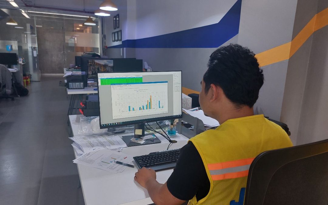 Civil engineer processing in Phnom Penh office the vibration monitoring data